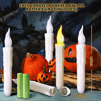 Electric candles with pumpkins and batteries on a Halloween-themed background