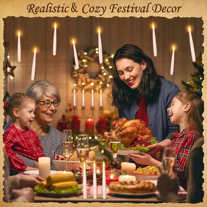 Family gathered around a festive dinner table with candles and holiday decorations.