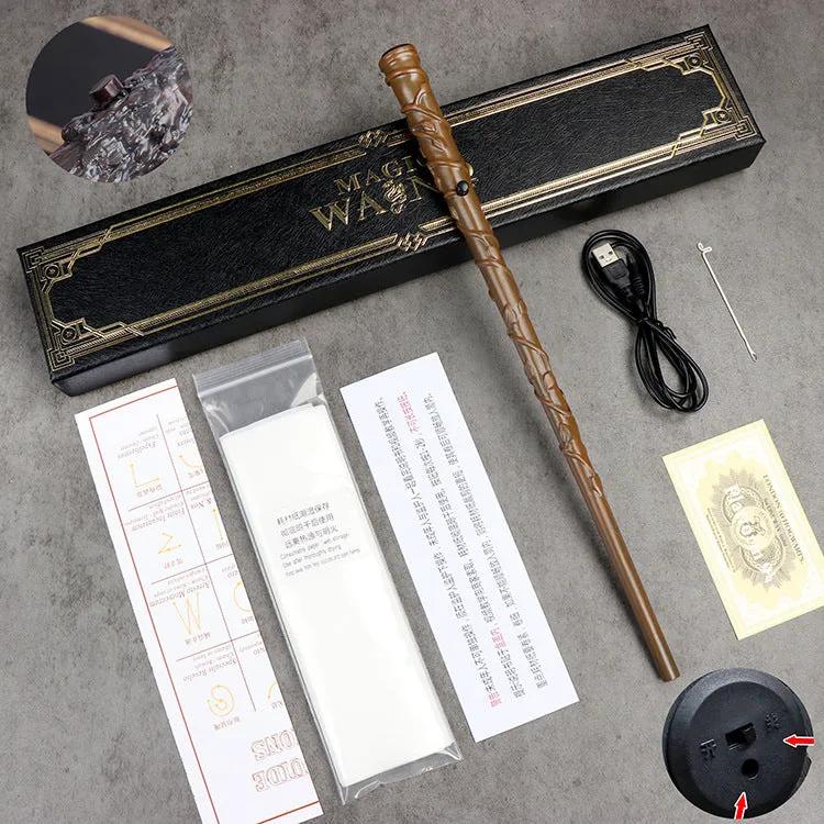 Hermione's magic wand with accessories on a gray surface