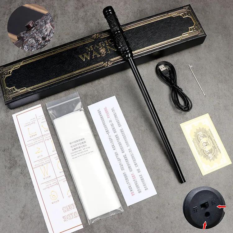 Snap Magic Wand with packaging, USB cable, and accessories on a gray surface